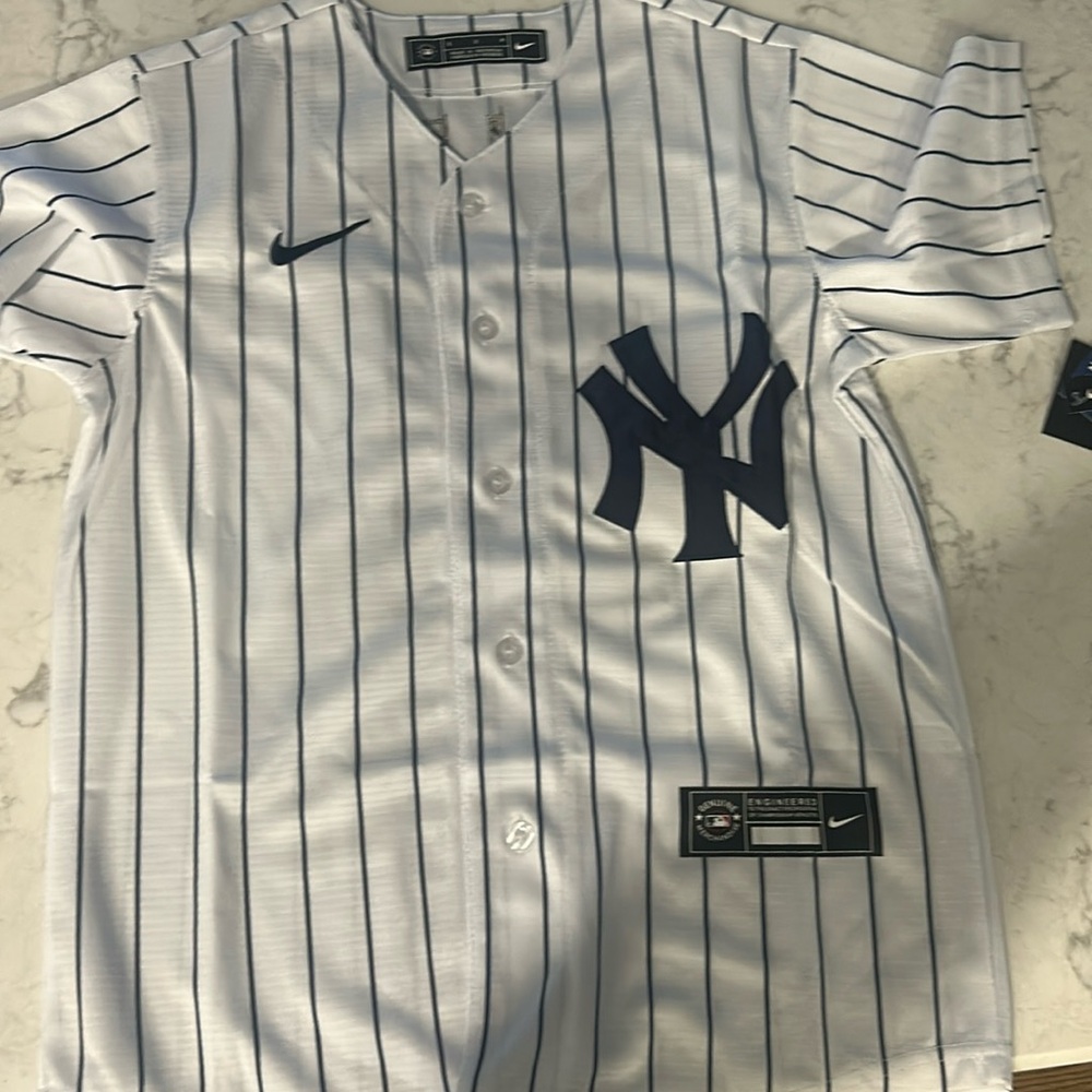 Boys size Small Yankees Volpe Jersey (#11). New with tags. Perfect condition.